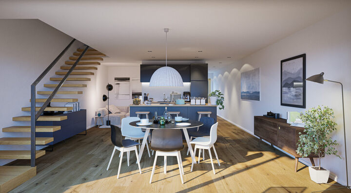 Blick zentral in eine Maisonette Wohnung mit Esstisch und Sonnenlicht