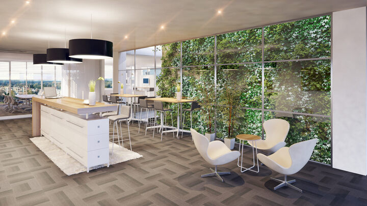 3D-Visualisierung einer modernen Bürolounge mit hoher Aufenthaltsqualität, begrünter Innenwand, Stehtischen und flexiblen Meeting-Bereichen