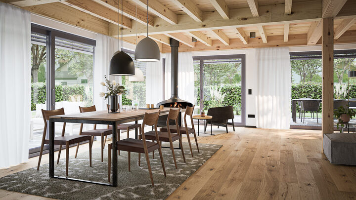 wohnzimmer mit holzbalkendecke in Holz Einfamilienhaus